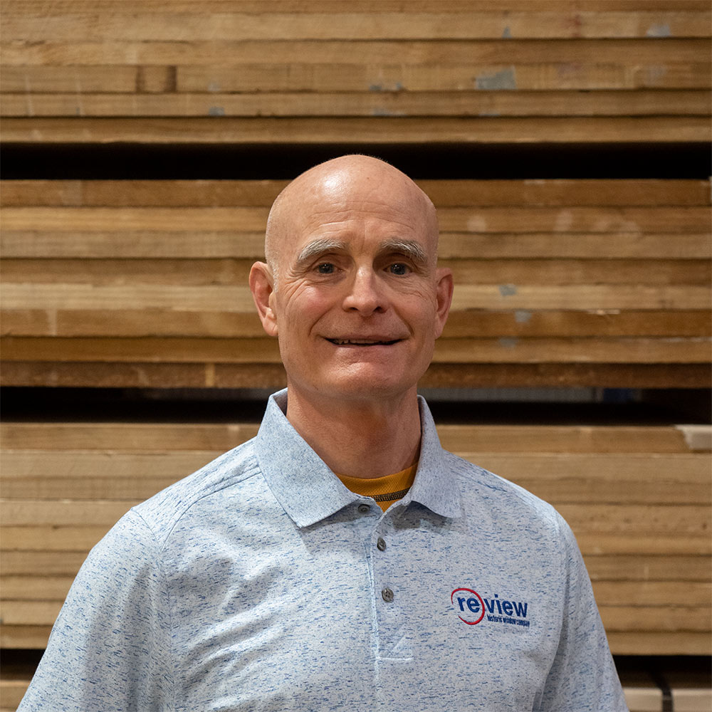 Brooks Gentleman stands in the Re-View wood shop.