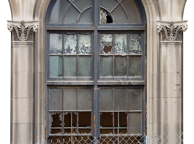 RV_photo_close_up_of_arched_window_renaissance_grand_hotel_COMPARISON_V2_0522_BEFORE A worn out window with broken panes in need of replacement.