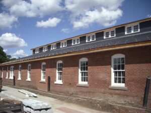 An exterior view of various windows on The Mule Barn after installation.