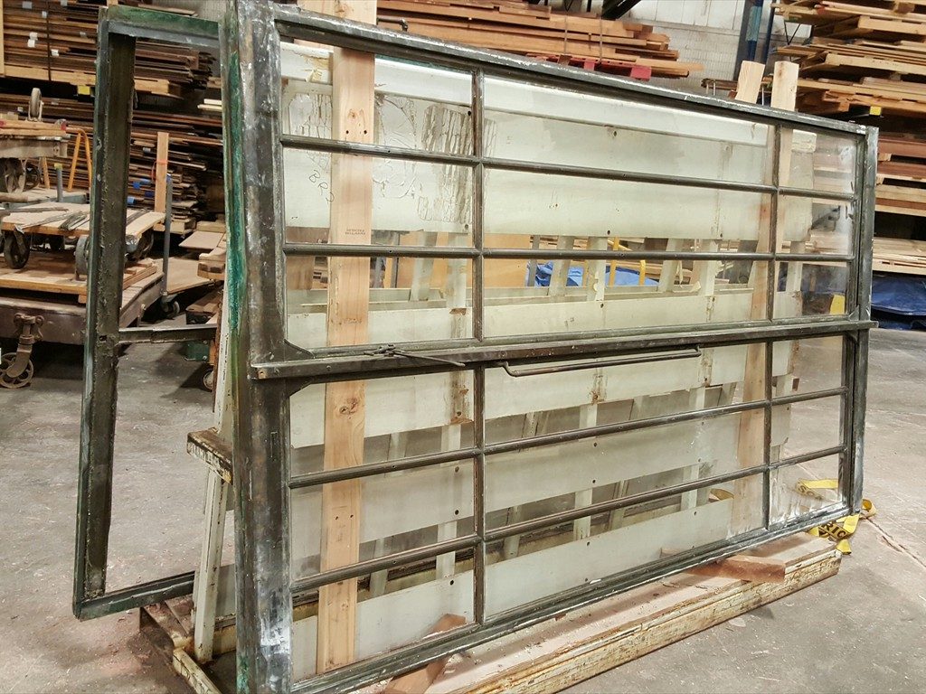 A metal window structure in the shop.