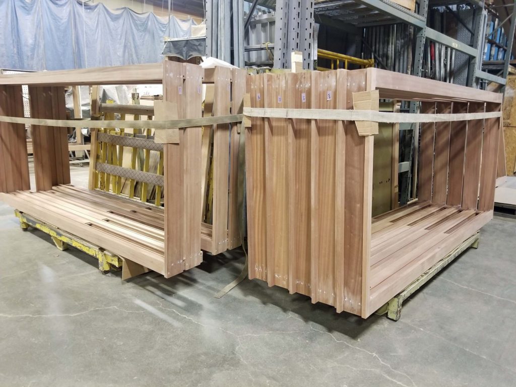 Finished window frames stored in the shop prior to delivery.