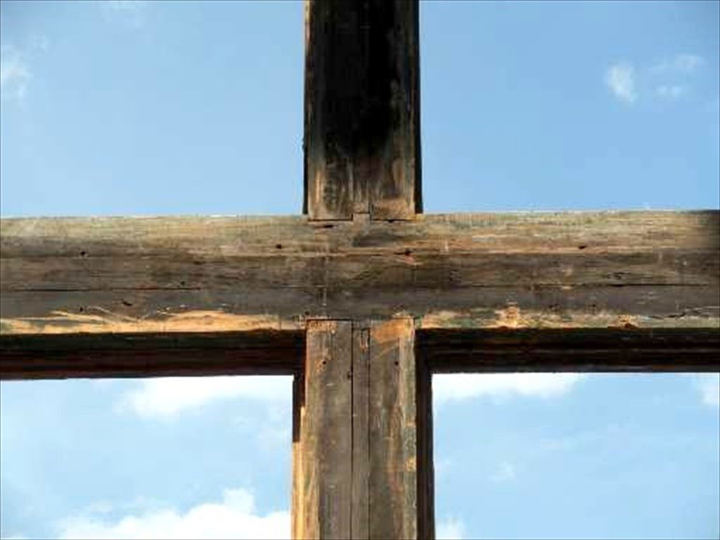 An old window sash in need of repair.