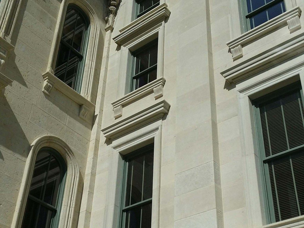 Multiple exterior windows on the Kansas Statehouse.
