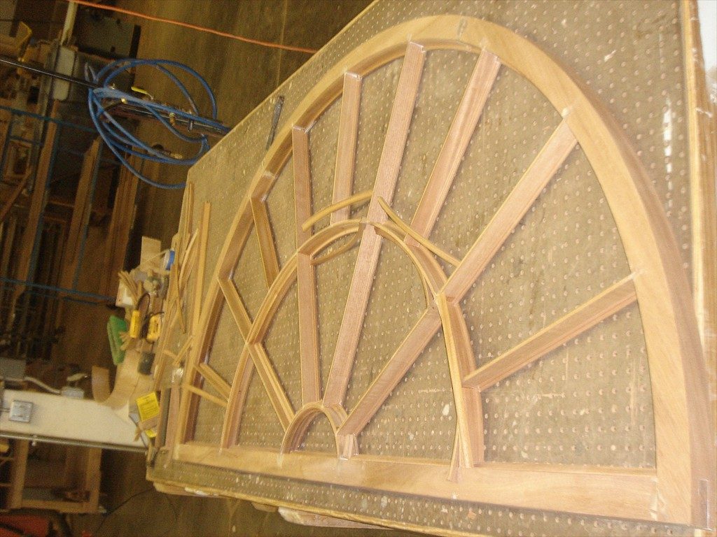 An arch window during the restoration process.