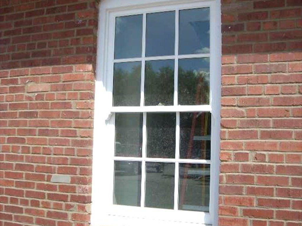 A detail view of one window on The Mule Barn after installation.