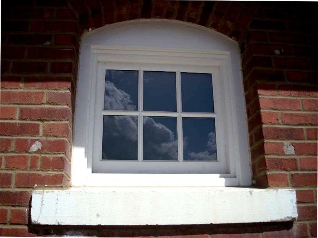 A detail view of one window on The Mule Barn after installation.