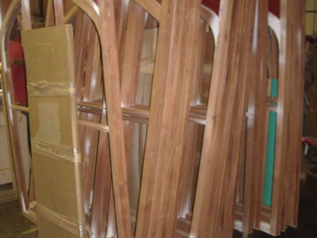 New wood window replicas in the shop awaiting installation.