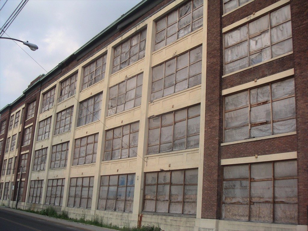 The exterior of the Framingham Manufacturing Building before renovation.