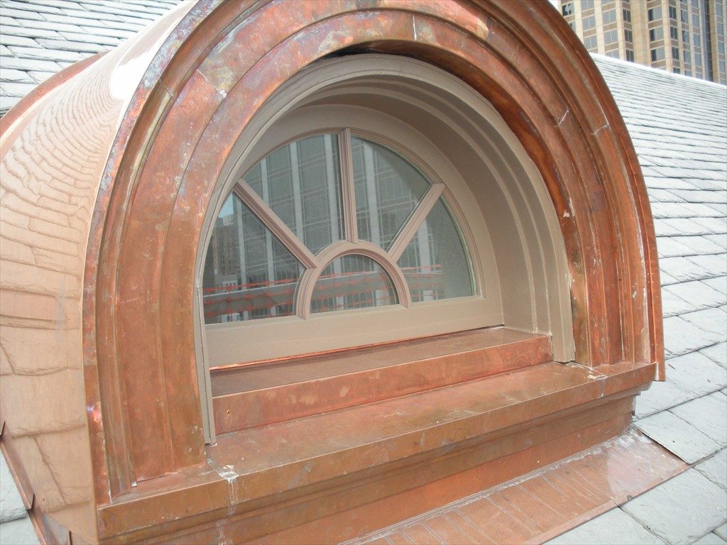 A completed half-circle window.